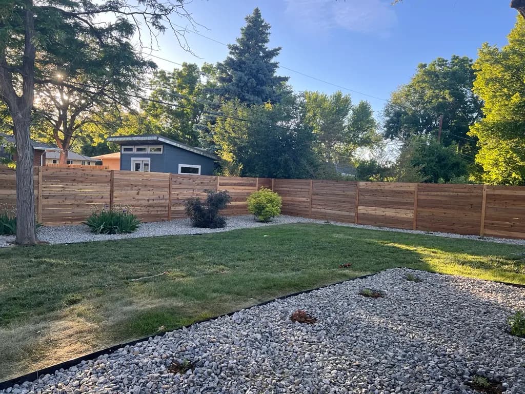 Custom horizontal cedar privacy fence built by Frontier Fence Work on Estes St in Lakewood, Colorado